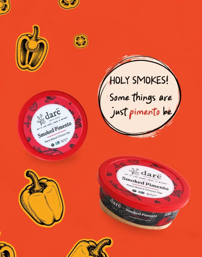 Two Darë Smoked Pimento cheese dip tubs on an orange background with pepper illustrations