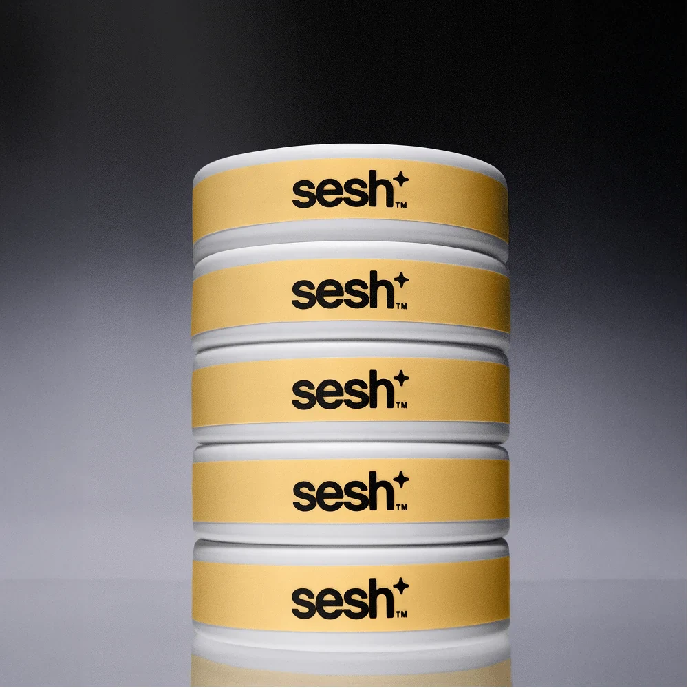 A stack of five Sesh pouches against a gray studio backdrop